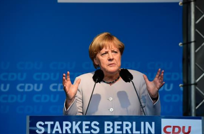 Merkel’s Party CDU Remains Largest in German State Election: Exit Polls 
